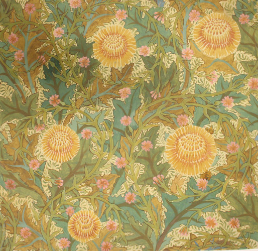 A busy floral pattern in greens and yellows