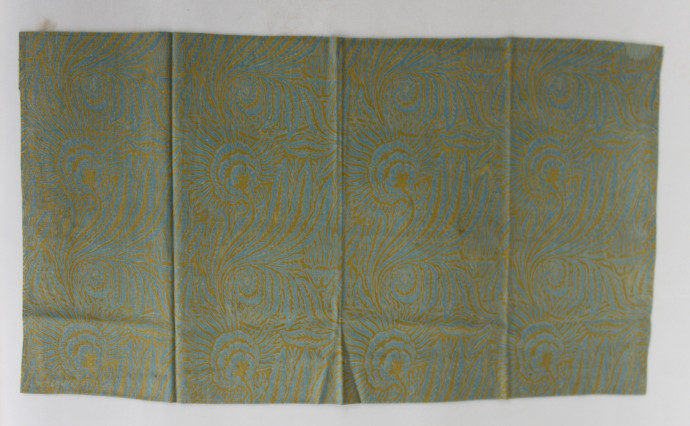 A swirling floral pattern in yellow and blue