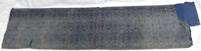 faded strip of Borage printed fabric with blue lining