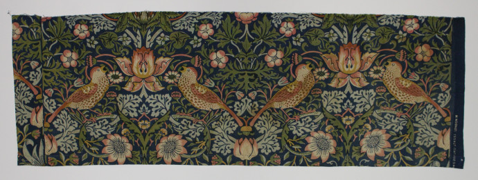 Fabric sample of a design featuring strawberry plants and thrushes. Printed in red, blue, yellow, green, orange, pink and white.