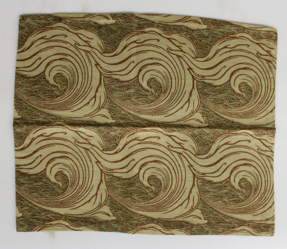 A repeating textile pattern in greens and browns