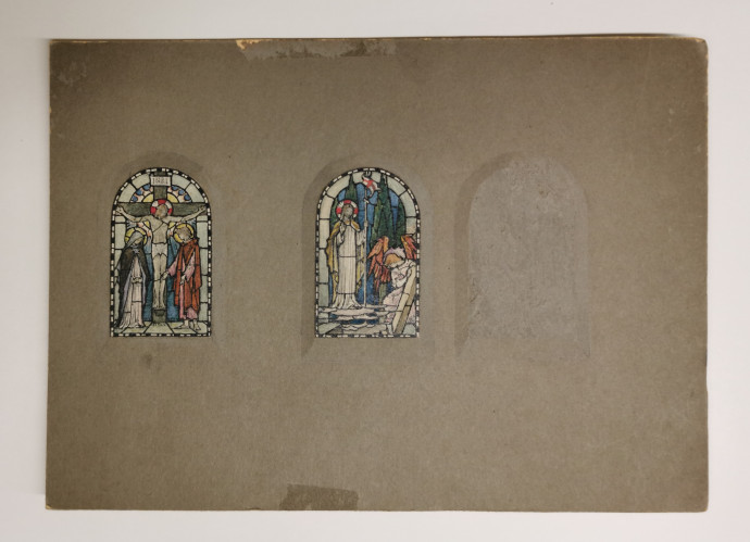 Card panel with two small stained glass window designs in colour