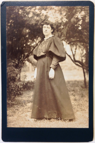 Photograph of Jenny Morris standing in a garden