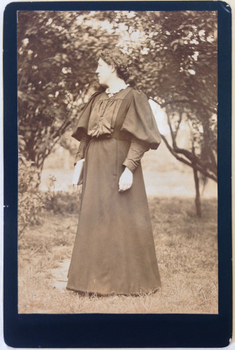 Photograph of Jenny Morris standing in a garden