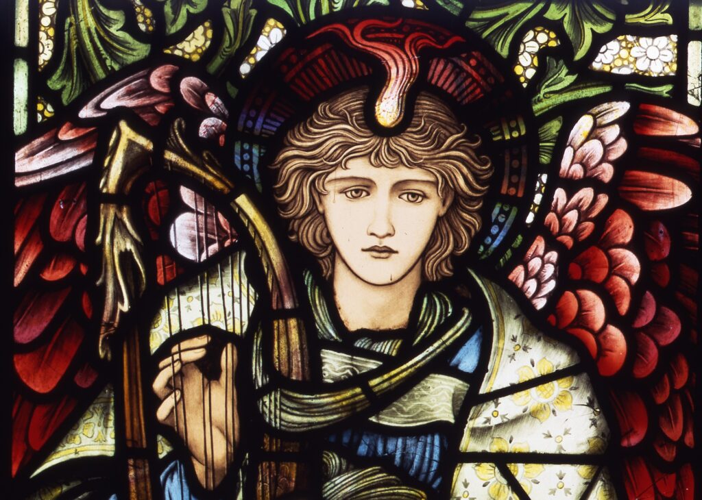 Stained glass of angel with harp