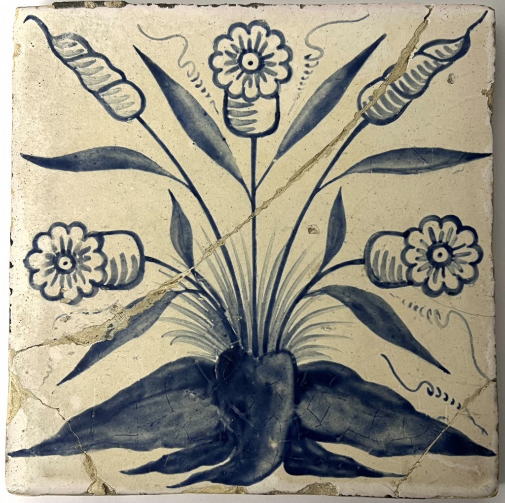 tile, hand painted with design of a clump of daisies